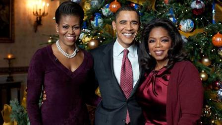 In this Dec. 3, 2009, photo released by the White House, President Barack Obama and first lady Michelle Obama, left, pose with Oprah Winfrey, right, in the Blue Room of the White House in Washington during a taping of a special, Christmas at the White House, airing Sunday, Dec. 13, at 10:00 p.m. EST on ABC. (AP Photo/The White House, Pete Souza)