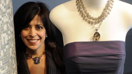 Fashion designer Maria Pinto is seen in her boutique in Chicago on Dec. 30, 2008. (AP Photo/David Banks)