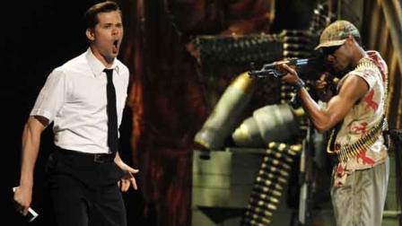 Andrew Rannells, left, and the cast of The Book of Mormon perform during the 65th annual Tony Awards, Sunday, June 12, 2011 in New York.