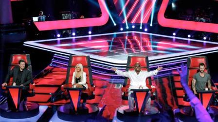 This June 2012 photo released by NBC shows mentors, from left, Blake Shelton, Christina Aguilera, Cee Lo Green and Adam Levine on the set of The Voice, in Los Angeles. The contest between The Voice and The X Factor is escalating after NBC scheduled its Voice against Wednesdays second-season debut of Foxs X Factor.