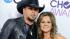 Jason Aldean and wife Jessica Ussery arrive at...
