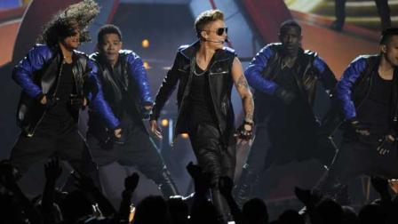 Justin Bieber, center, performs at the Billboard Music Awards at the MGM Grand Garden Arena in Las Vegas.