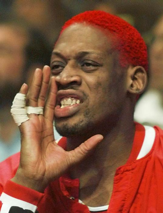 Chicago Bulls' Dennis Rodman, with a new red...