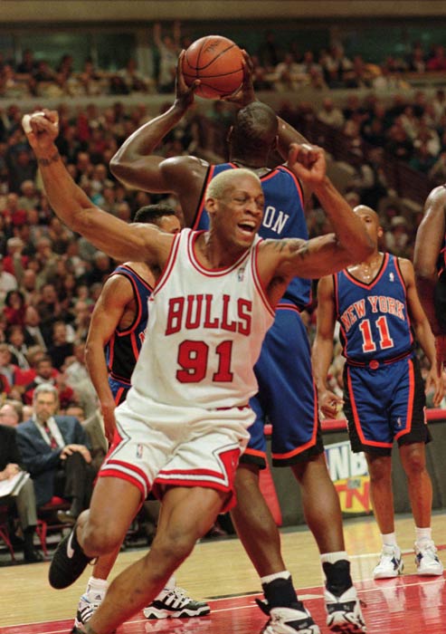 Chicago Bulls forward Dennis Rodman celebrates an early basket over the New York Knicks during the teams' playoff game Tuesday, May 14, 1996, in Chicago.  (AP Photo/Beth A. Keiser)