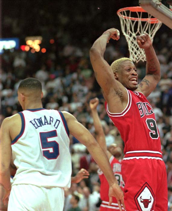 Chicago Bulls Dennis Rodman celebrates the Bulls...