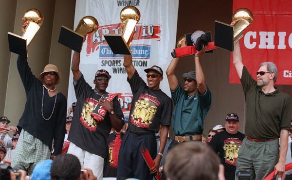 The Chicago Bulls' Dennis Rodman, left, Michael...