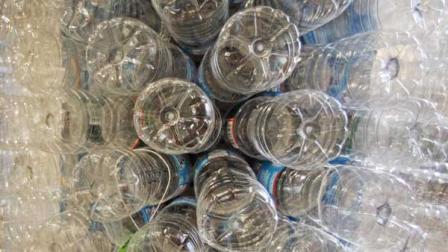 [FILE] This Wednesday, Dec. 5, 2012 file photo shows a sculpture made of empty water bottles in Burlington, Vt.  