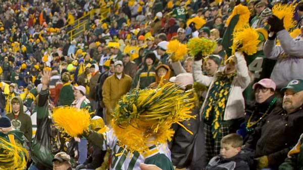 Green Bay Packers fans cheer during a pep rally at Lambeau Field in Green Bay, Wis.