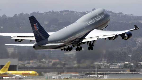 FILE: A United Airlines plane leaves San Francisco International Airport July 31, 2006.