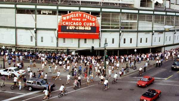 FILE-- People in a line around Wrigley Field in Chicago for tickets to a game. (AP)