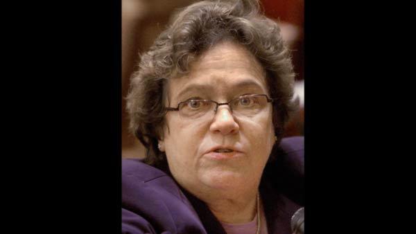 Then-Illinois state Sen. Carol Ronen, D-Chicago, fields questions from the news media while on the Senate floor during session at the Illinois State Capitol in Springfield, Ill., Monday, Jan. 10, 2005. (AP Photo/Seth Perlman)