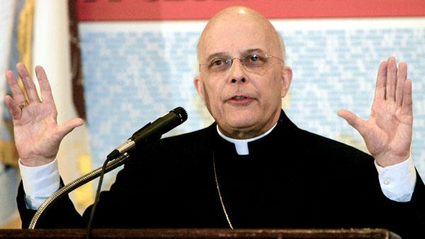 Cardinal Francis George speaks at the City Club of Chicago Thursday, April 6, 2006, in this file photo. (AP Photo/Charles Rex Arbogast)