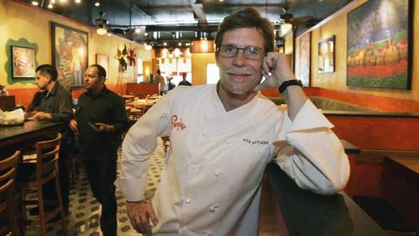 Chef Rick Bayless, poses in his Chicago restaurant, Frontera Grill, Tuesday, May 8, 2007. (AP Photo/Charles Rex Arbogast)