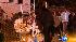 Community prays for victims, looks for... ::