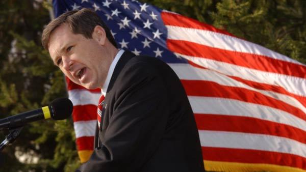 Rep. Mark Kirk, R-Ill., addresses a rally held to support U.S. troops Sunday, March 23, 2003, in Arlington Heights, Ill. (AP Photo/Allen Kaleta)