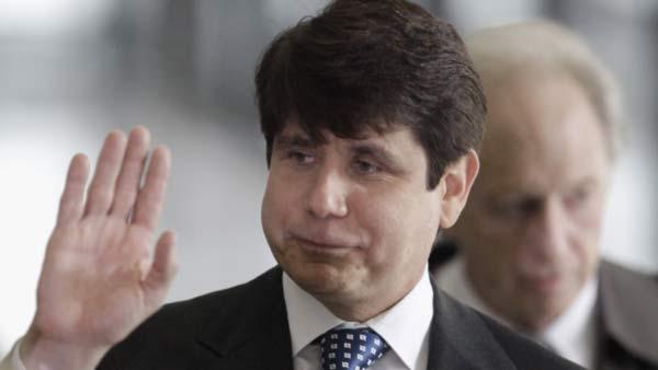 In this April 21, 2009 file photo, ousted Illinois Gov. Rod Blagojevich is seen leaving federal court in Chicago. (AP Photo/M. Spencer Green, File)
