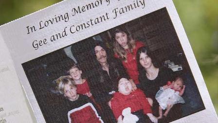 Memorial pamphlet is seen as friends and family of the Gee family exit the Family Life Center in Mount Pulaski, Ill., Monday Sept. 28, 2009 for their funeral, a week after the two parents and three children were found dead in their Beason home. Top center is Raymond Gee; top right is Justina Constant; top left is Austin Gee; bottom left is Dillen Constant; bottom center child is unidentified; bottom right is Ruth Constant Gee with daughter Tabitha. (AP Photo/Seth Perlman)