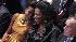 U.S. first lady Michelle Obama sits with...