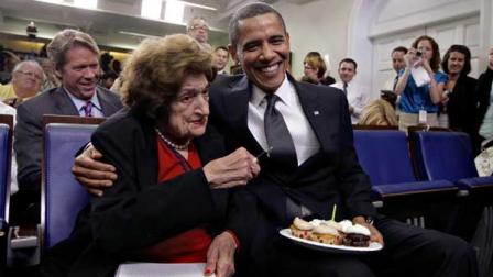 President Barack Obama, marking his 48th birthday, takes a break from his official duties to bring birthday greetings to veteran White House reporter Helen Thomas, left, who shares the same birthday and turns 89, Tuesday, Aug. 4, 2009, in the White House Press Briefing Room in Washington.