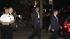President Barack Obama waves as he leaves from...