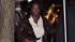 Television host Oprah Winfrey gets into her...