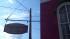A sign hangs from the fictional Smallville Hotel...