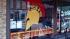 A sign in the fictional downtown cheers on the...