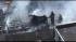 Firefighters battle rooftop blaze