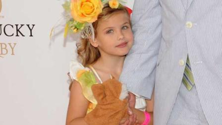 Larry Birkhead and his daughter Dannielynn walk the Kentucky Derby Red Carpet in Louisville, Ky.