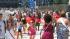 Lollapalooza fans and visitors storm the front...