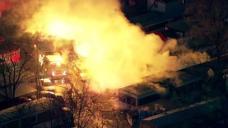 Flames roared through at least one trailer at a trailer park near Des Plaines on January 22, 2013.