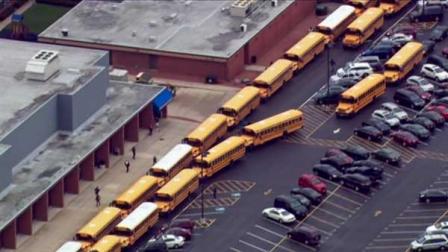 Buses outside Carl Sandburg High School in Orland Park