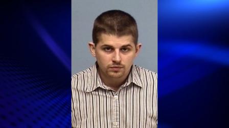 Benjamin M. Davidson, 30, is shown in this mug shot provided by Lake Forest police. Davidson was charged June 7, 2013 in connection with an alleged sexual relationship with two female students under the age of 18.