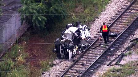 Metra Rock Island trains are experiencing delays near 103rd Street after a train struck a car near the Beverly Hills and 103rd Street.
