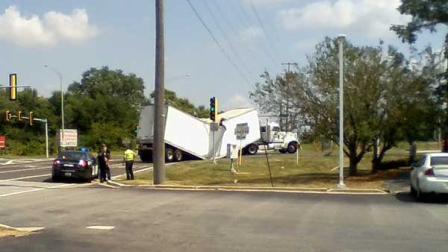 A truck collapsed onto itself at a busy intersection in Chicago Heights on August 29, 2013.