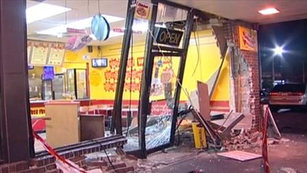 An SUV crashed into the front of the RJ Fish and Chicken restaurant in the 1900 block of East 95th Street early Saturday.
