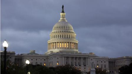 The Capitol in Washington is seen under an overcast sky at dawn, Monday, Oct. 7, 2013. The government shutdown entered its second week with no end in sight and ominous signs that the United States was closer to the first default in the nations history as Speaker John Boehner ruled out any measure to boost borrowing authority without concessions from President Barack Obama. 