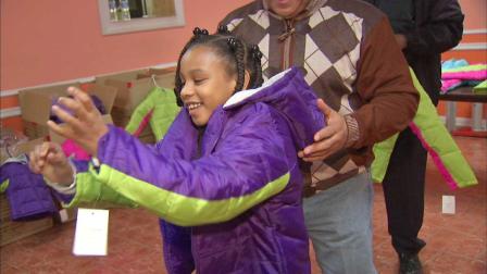 Just in time for the frigid temperatures to arrive, 300 young people in suburban Dolton are receiving new coats.