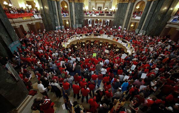 Protestors of Wisconsin Gov. Scott Walker's bill...