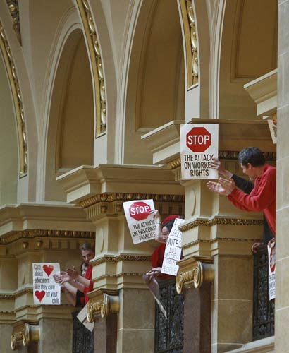 Protestors to Wisconsin Gov. Scott Walker's bill...