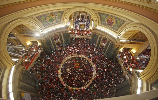Protestors to Wisconsin Gov. Scott Walker's bill...