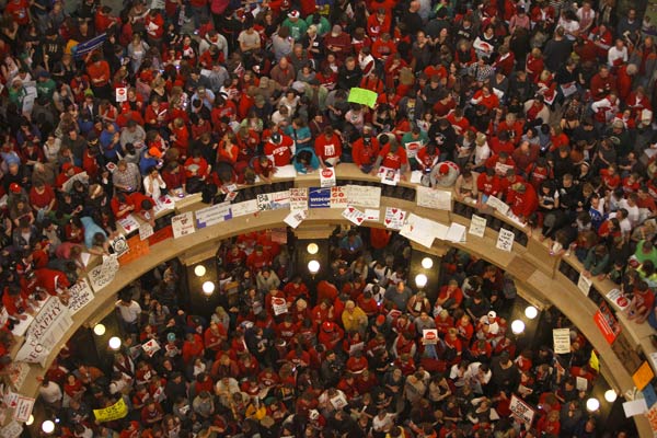 Protestors of Wisconsin Gov. Scott Walker's bill...