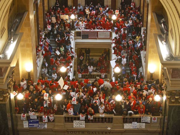 Protestors to Wisconsin Gov. Scott Walker's bill...