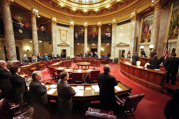 Wisconsin Republican state senators stand as...