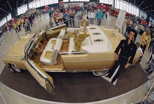 Crowds at an auto show look at a custom-made...
