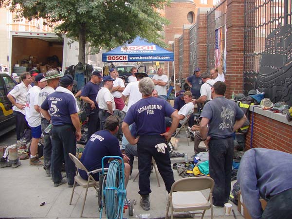 Schaumburg and Chicago firemen resting in their...