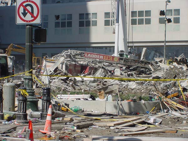 Ladder 13 fire engine buried in debris