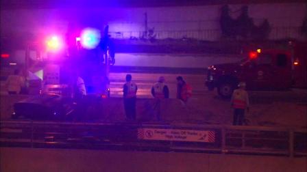 A semi-truck crashed through wall at a set of CTA Red Line tracks on the South Side at 69th and the Dan Ryan Expressway.