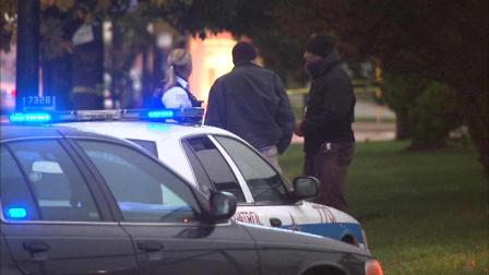 A woman is accidentally shot while in the back of a Chicago police squad car.