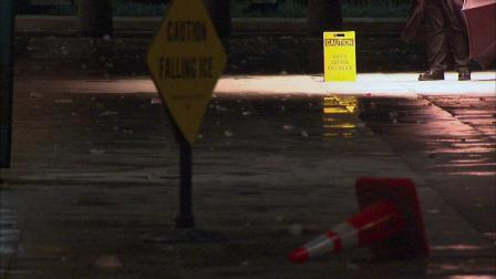 Melting ice is creating dangerous conditions along Chicagos Magnificent Mile as melting chunks of ice are falling from the Hancock building creating a danger for pedestrians and drivers Friday night.
